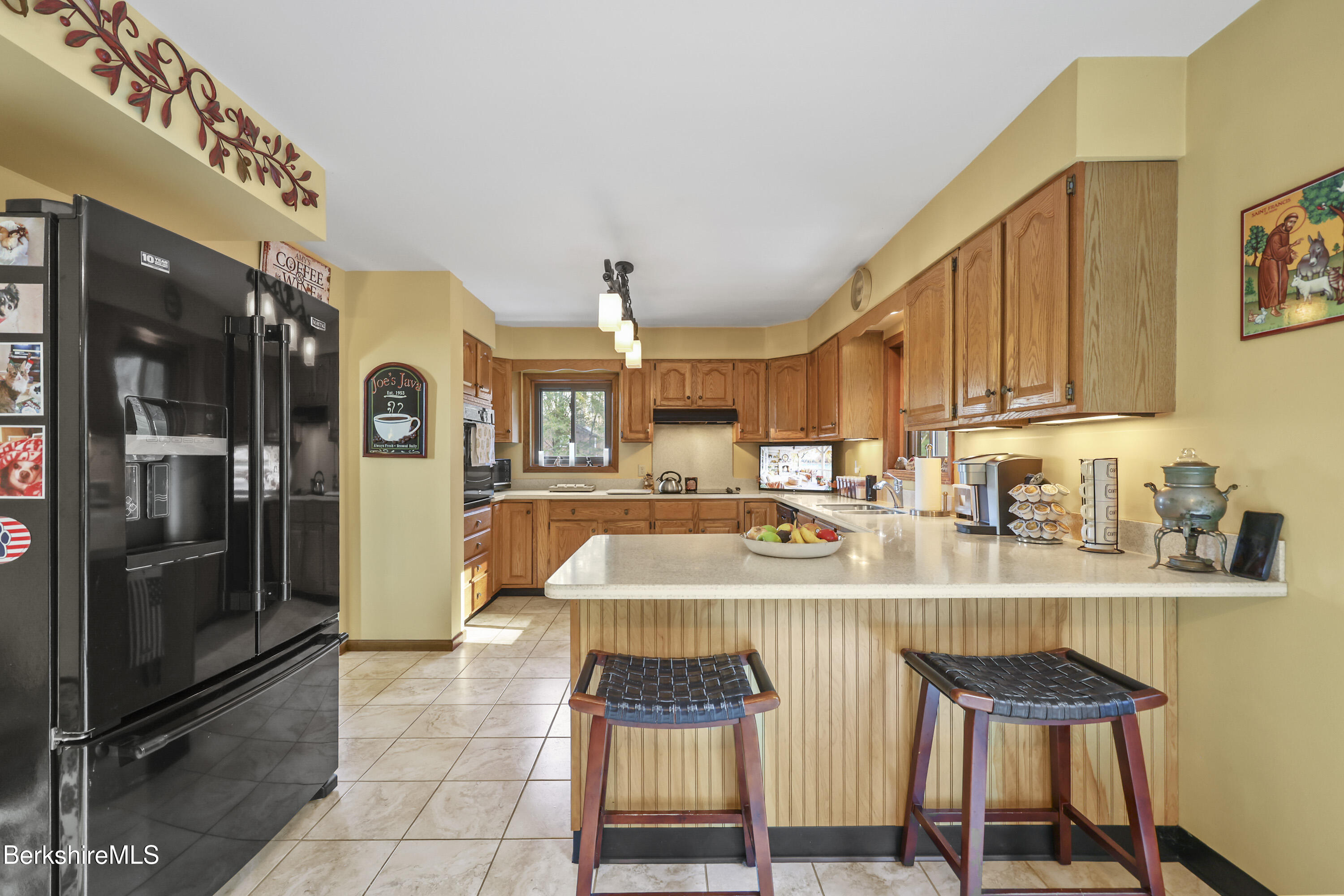 551 Tamarack Road Pittsfield, MA 01201 - Photo 15 of 51 a very nice looking kitchen with a large window