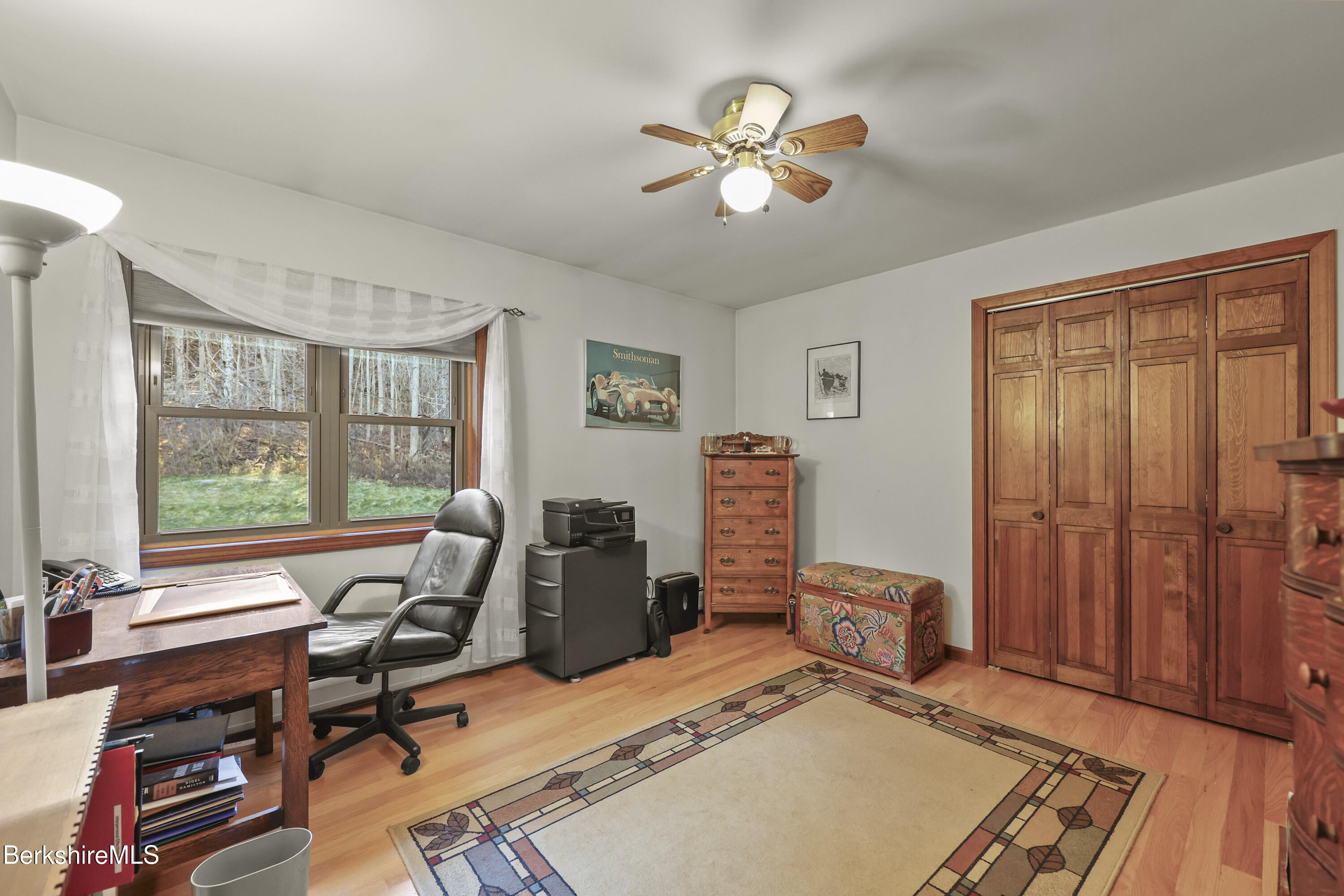 551 Tamarack Road Pittsfield, MA 01201 - Photo 32 of 51 a view of a workspace with furniture and a window