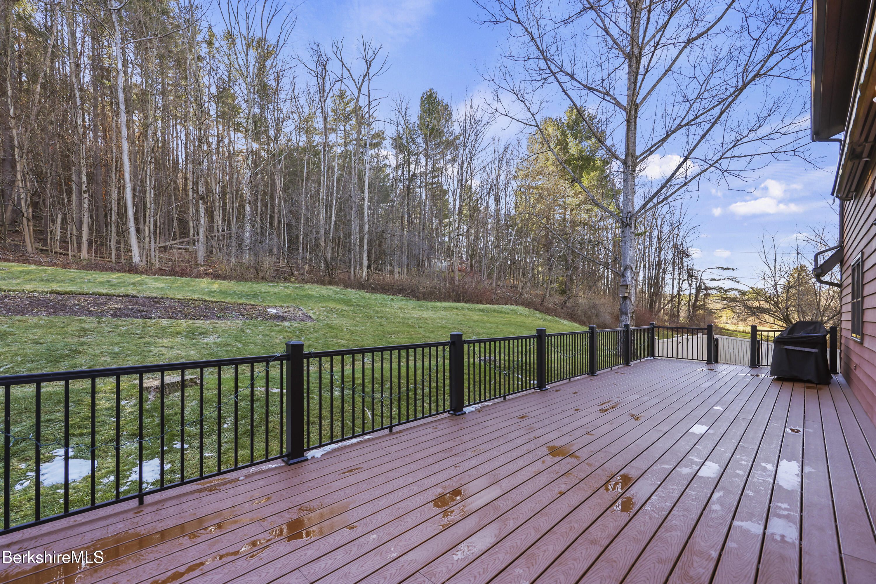 551 Tamarack Road Pittsfield, MA 01201 - Photo 41 of 51 a view of a deck with a yard