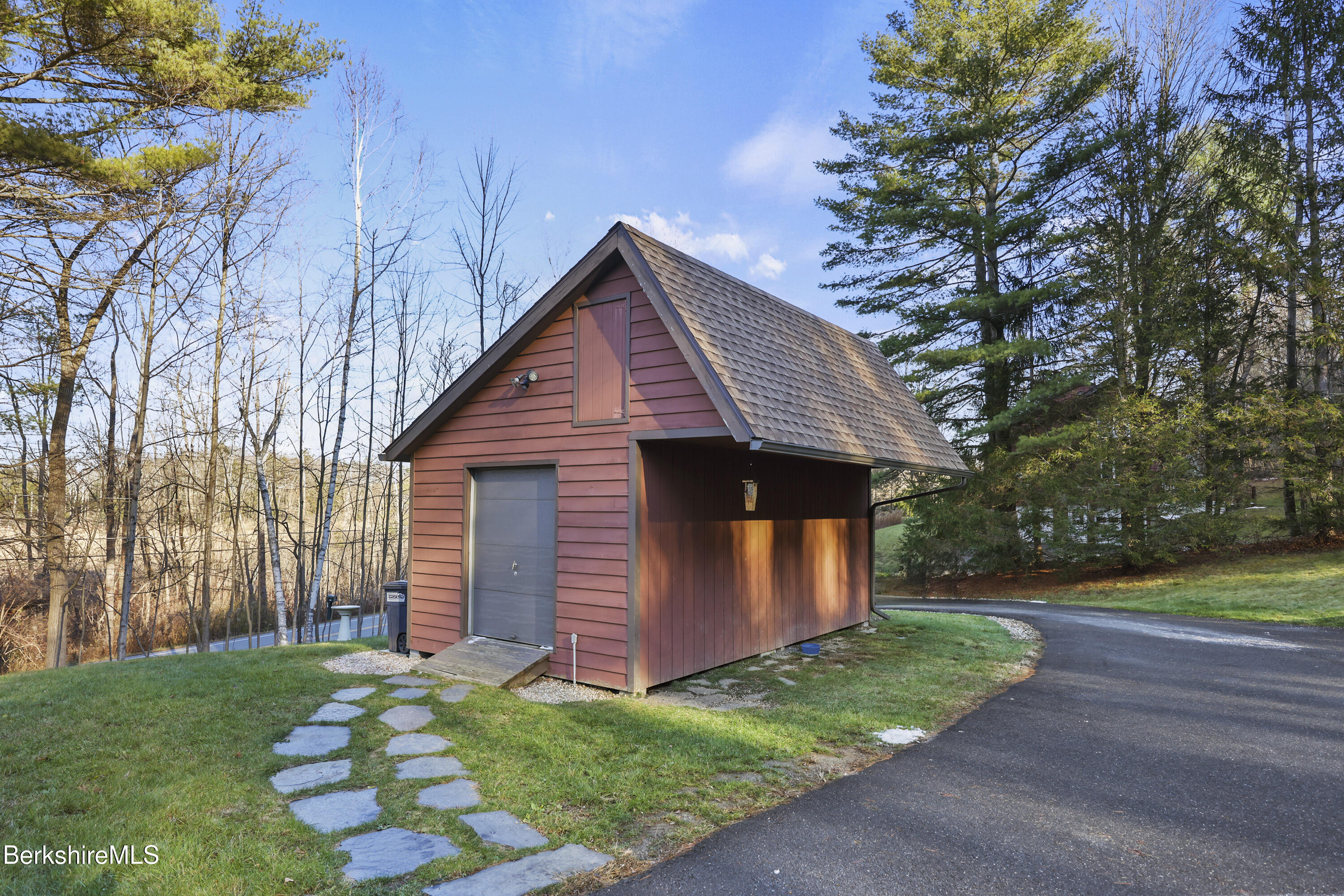 551 Tamarack Road Pittsfield, MA 01201 - Photo 42 of 51 a front view of a house with garden