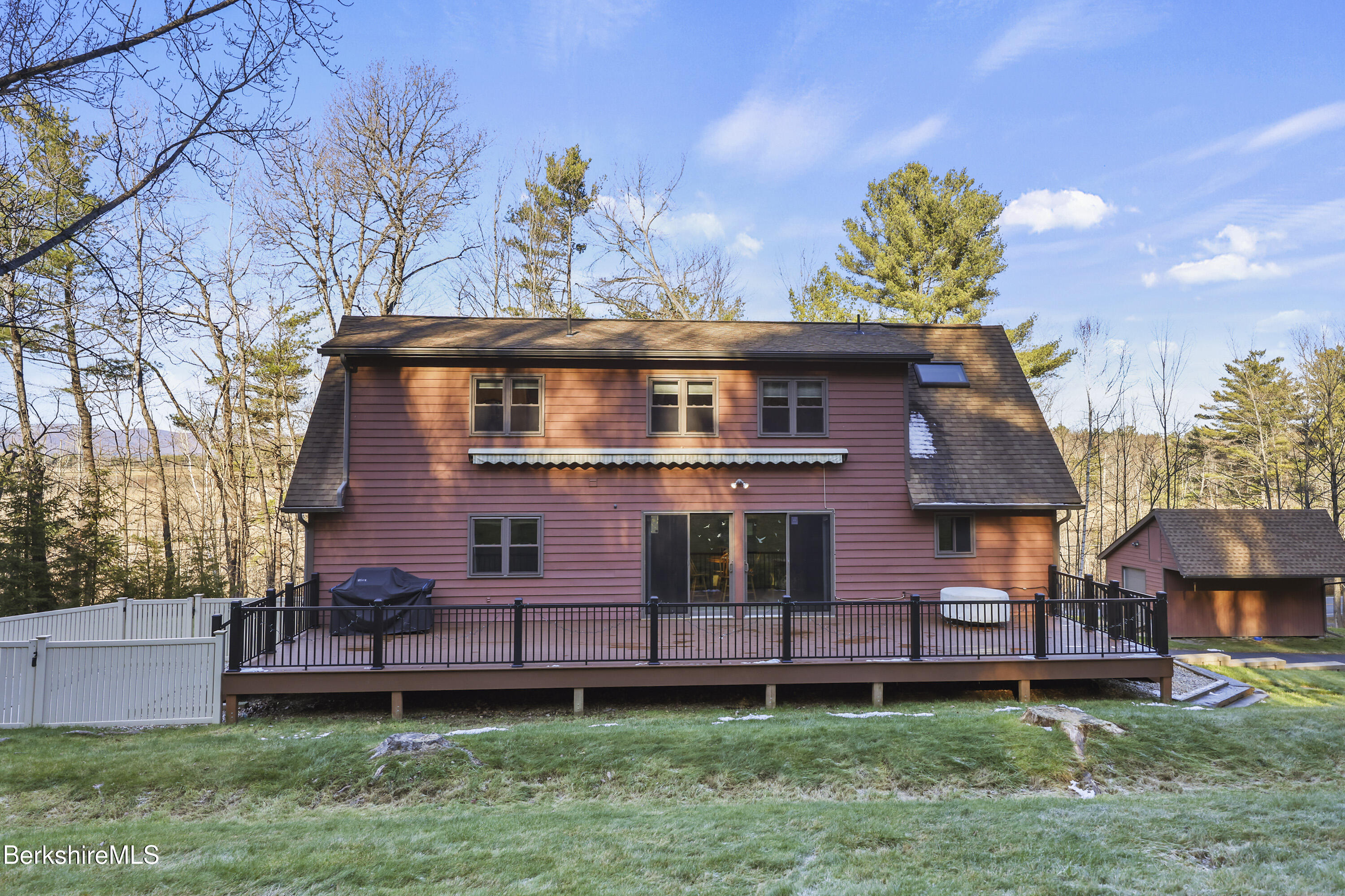 551 Tamarack Road Pittsfield, MA 01201 - Photo 47 of 51 a front view of a house with a garden