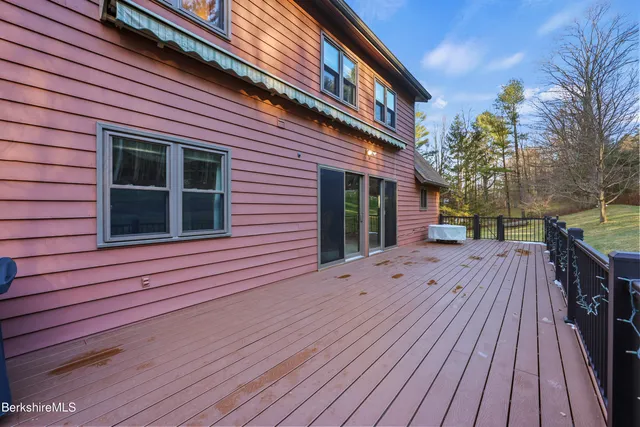 a view of a house with a roof deck