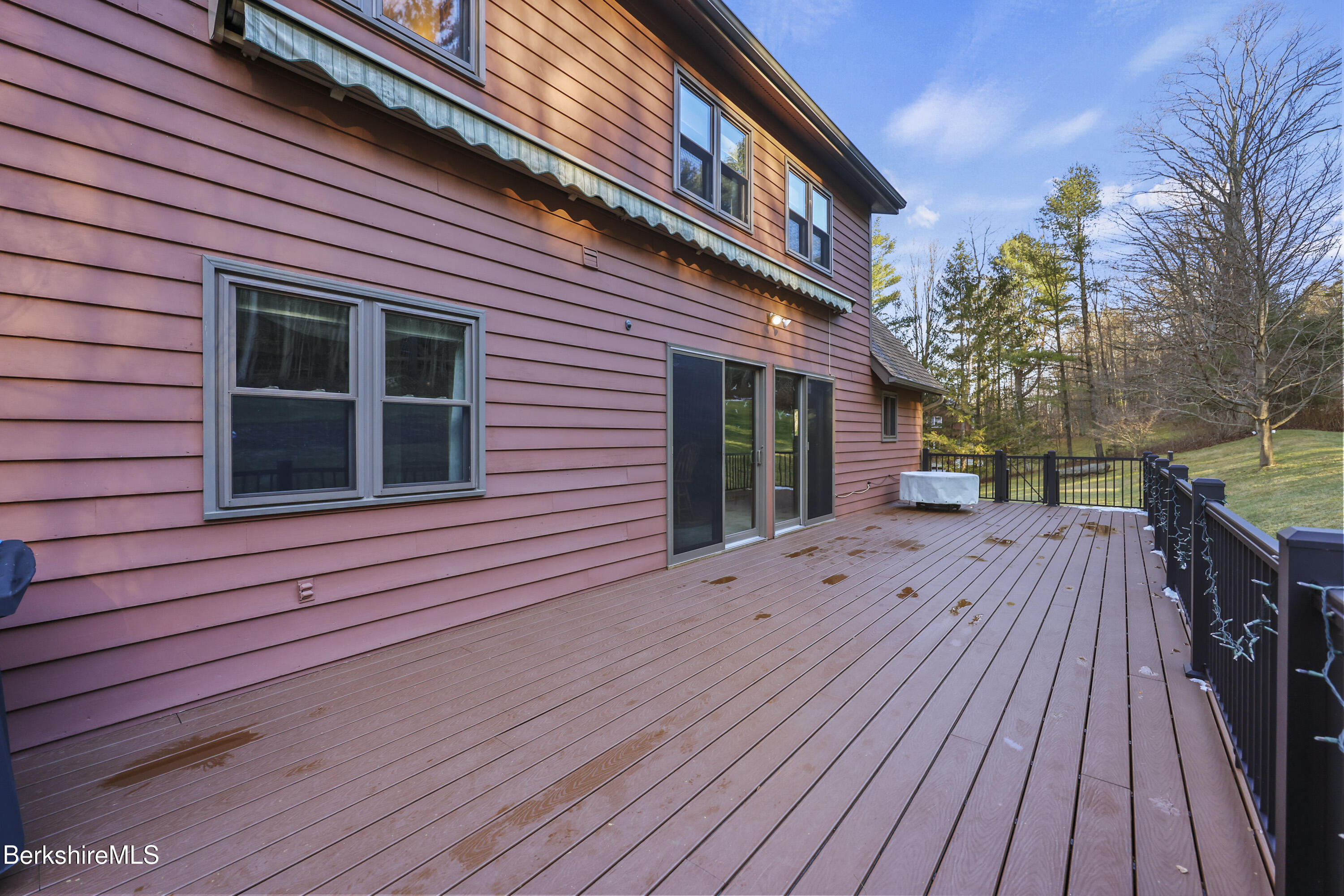 551 Tamarack Road Pittsfield, MA 01201 - Photo 50 of 51 a view of a house with a wooden deck