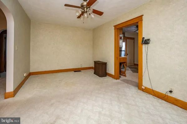 a living room with furniture fireplace and a flat screen tv