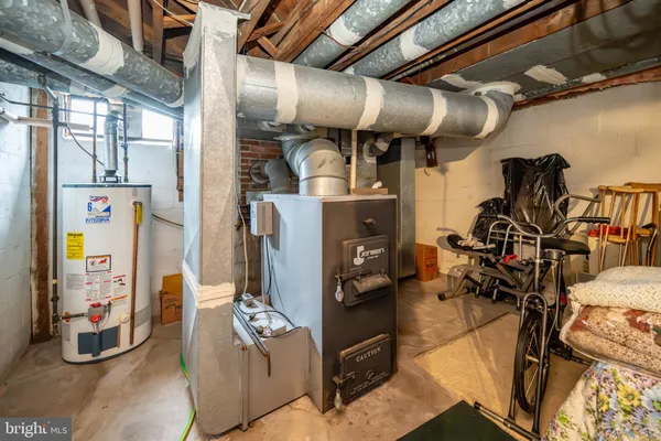 a view of a patio with table and chairs and potted plants