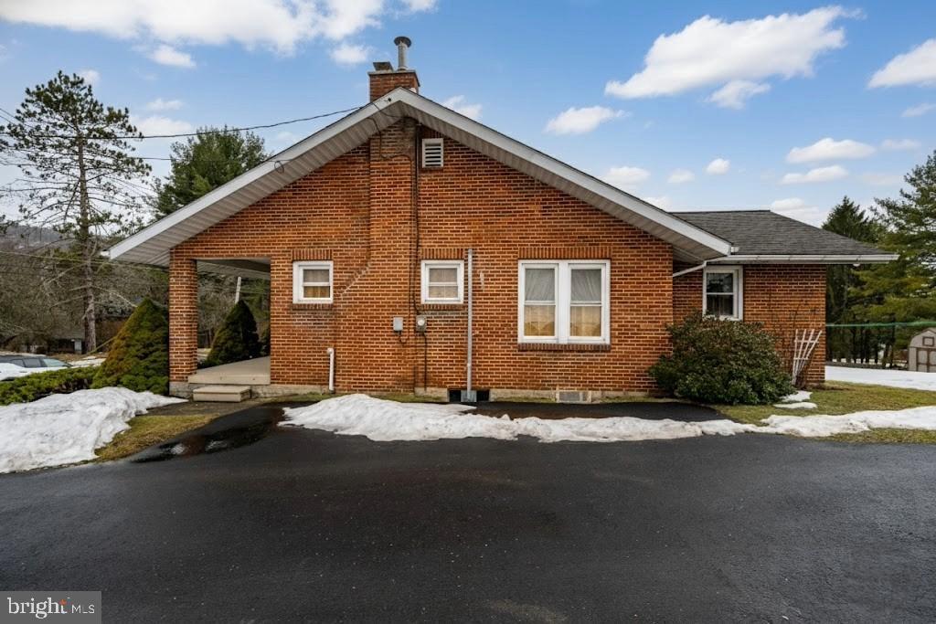 313 West Liberty Street Oakland, MD 21550 - Photo 49 of 59 a view of a house with backyard and garden