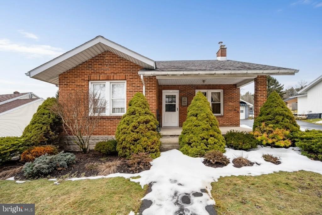 313 West Liberty Street Oakland, MD 21550 - Photo 54 of 59 a front view of a house with a yard