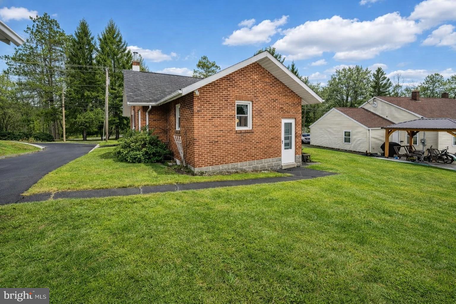 313 West Liberty Street Oakland, MD 21550 - Photo 56 of 59 a front view of house with yard and green space