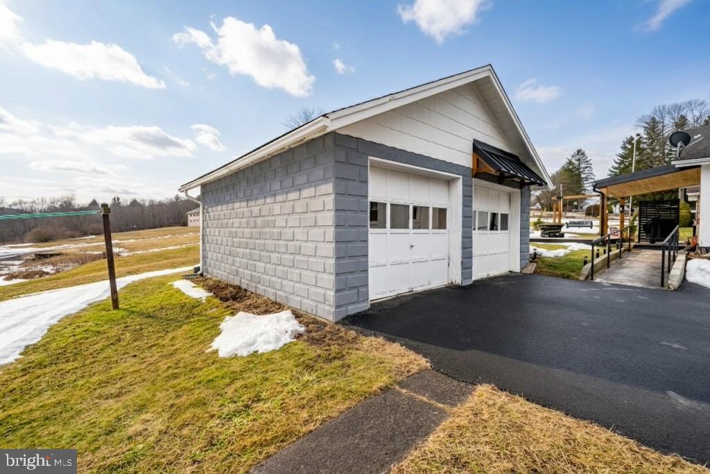 313 West Liberty Street Oakland, MD 21550 - Photo 57 of 59 Charming garage with scenic backdrop.