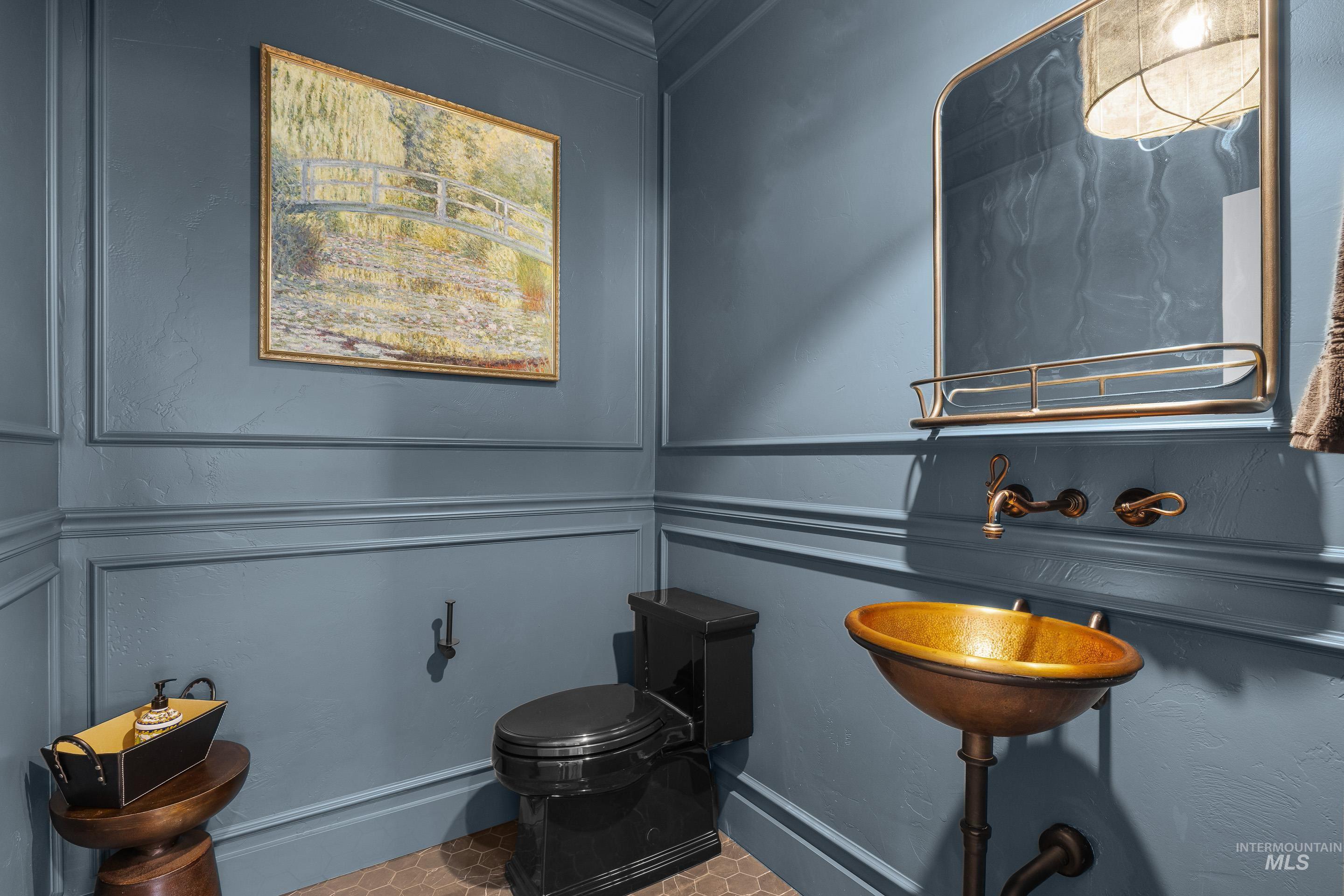 1166 East Rivers End Drive Eagle, ID 83616 - Photo 23 of 50 Bathroom featuring a decorative wall and crown molding