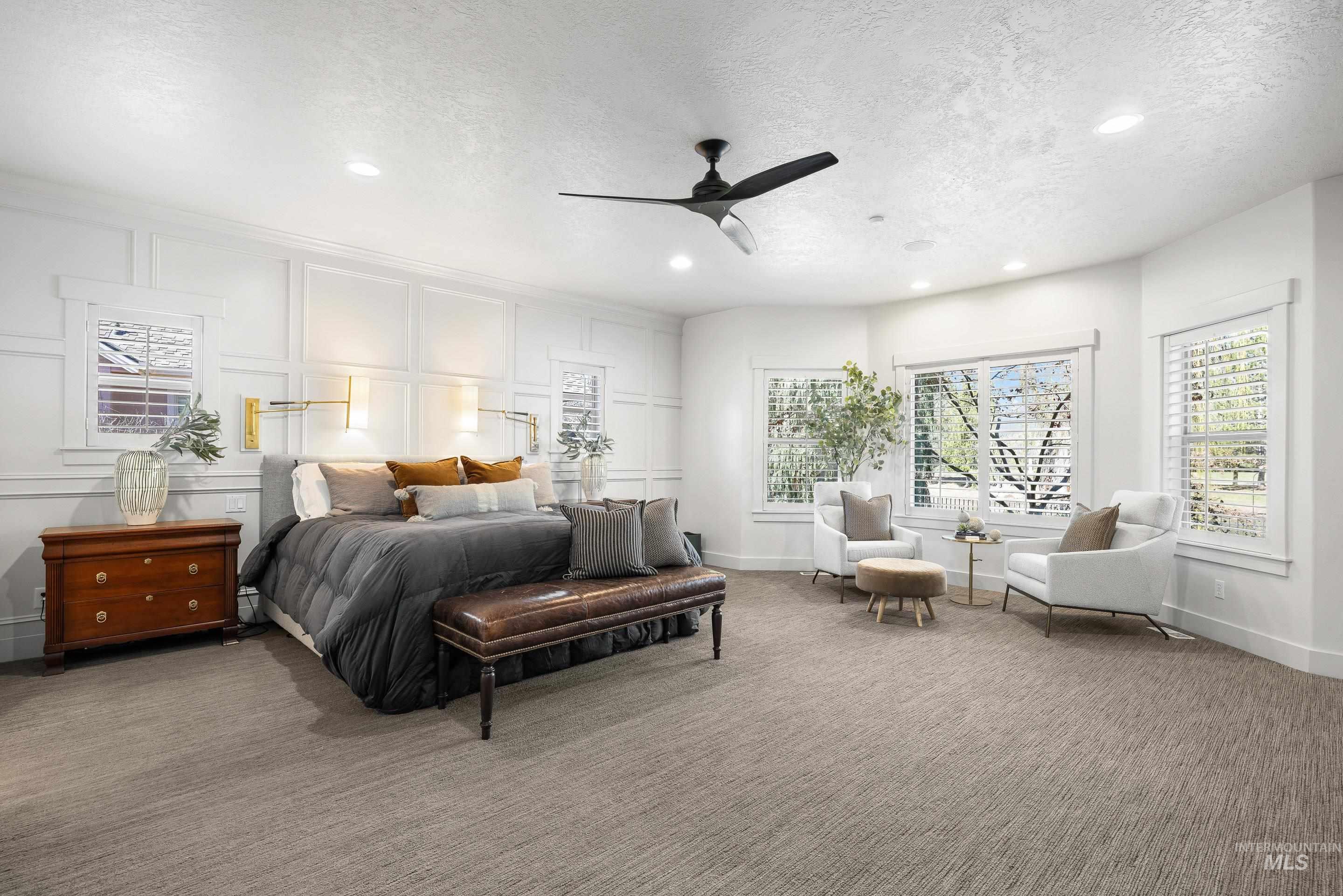 1166 East Rivers End Drive Eagle, ID 83616 - Photo 24 of 50 Carpeted bedroom with a decorative wall, a textured ceiling, ceiling fan, and recessed lighting