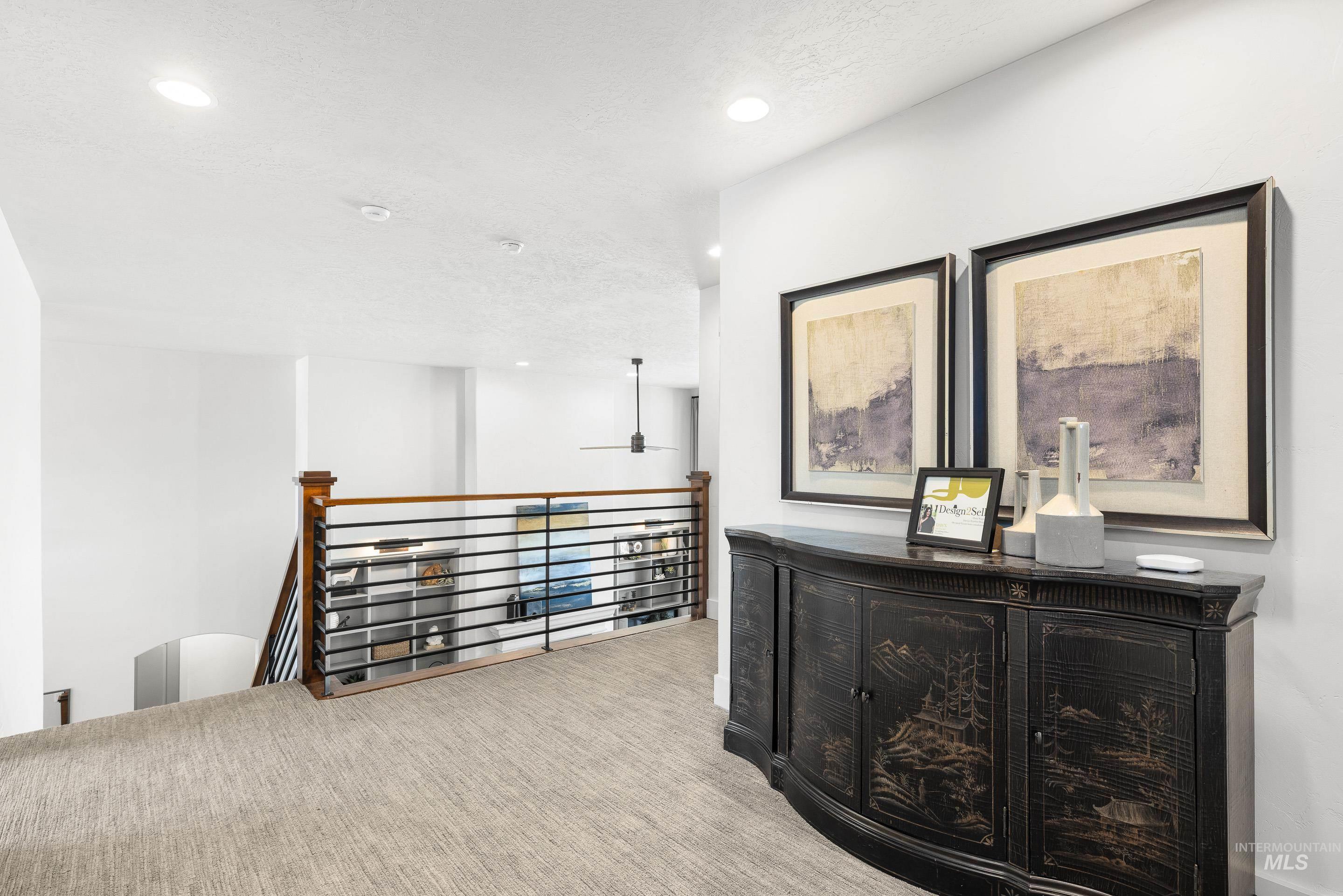 1166 East Rivers End Drive Eagle, ID 83616 - Photo 30 of 50 Hall featuring recessed lighting, carpet flooring, and an upstairs landing