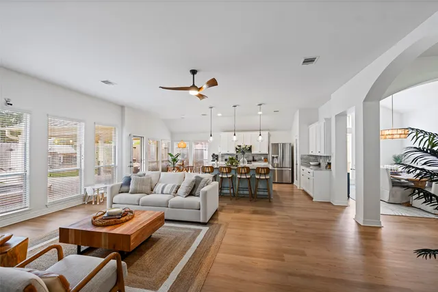a living room with furniture and a table