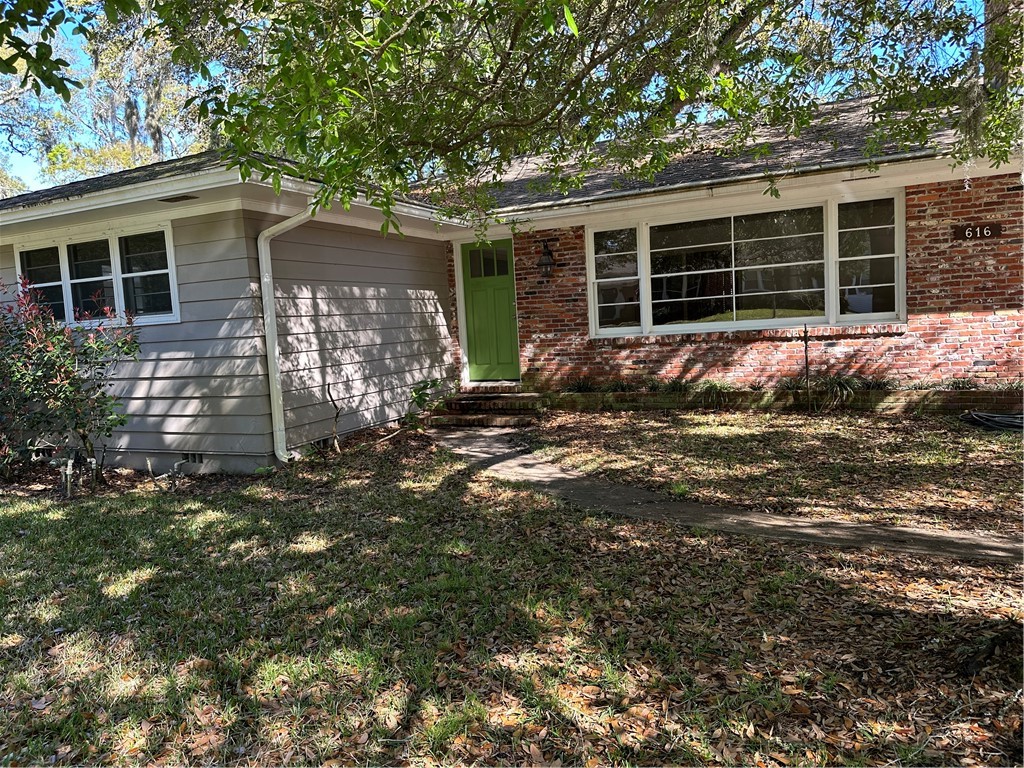 616 Neptune Way St. Simons Island, GA 31522 - Photo 2 of 13 Front View 2
