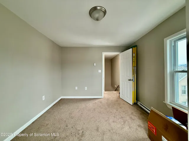 an empty room with window