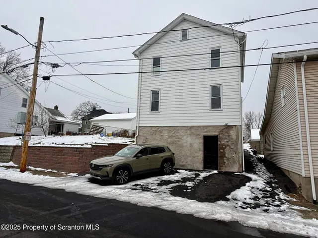 a front view of a house with yard