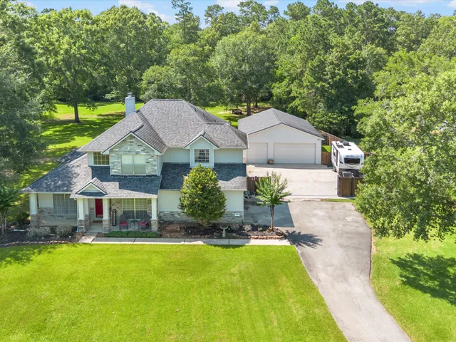 a house view with a garden space