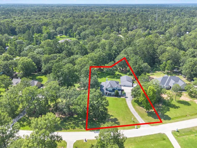 a view of a yard with an outdoor space