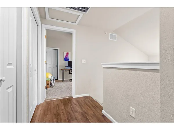 a view of wooden floor in living room