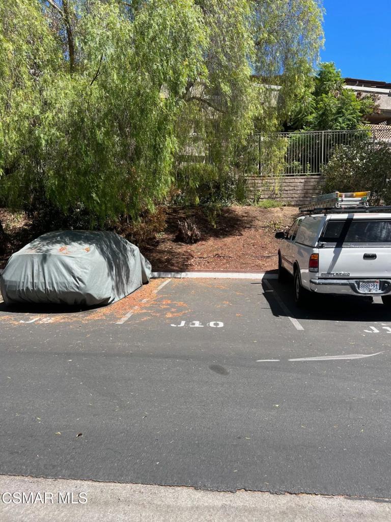 86 Maegan Place, Unit 10 Thousand Oaks, CA 91362 - Photo 15 of 15 a view of street with parked cars