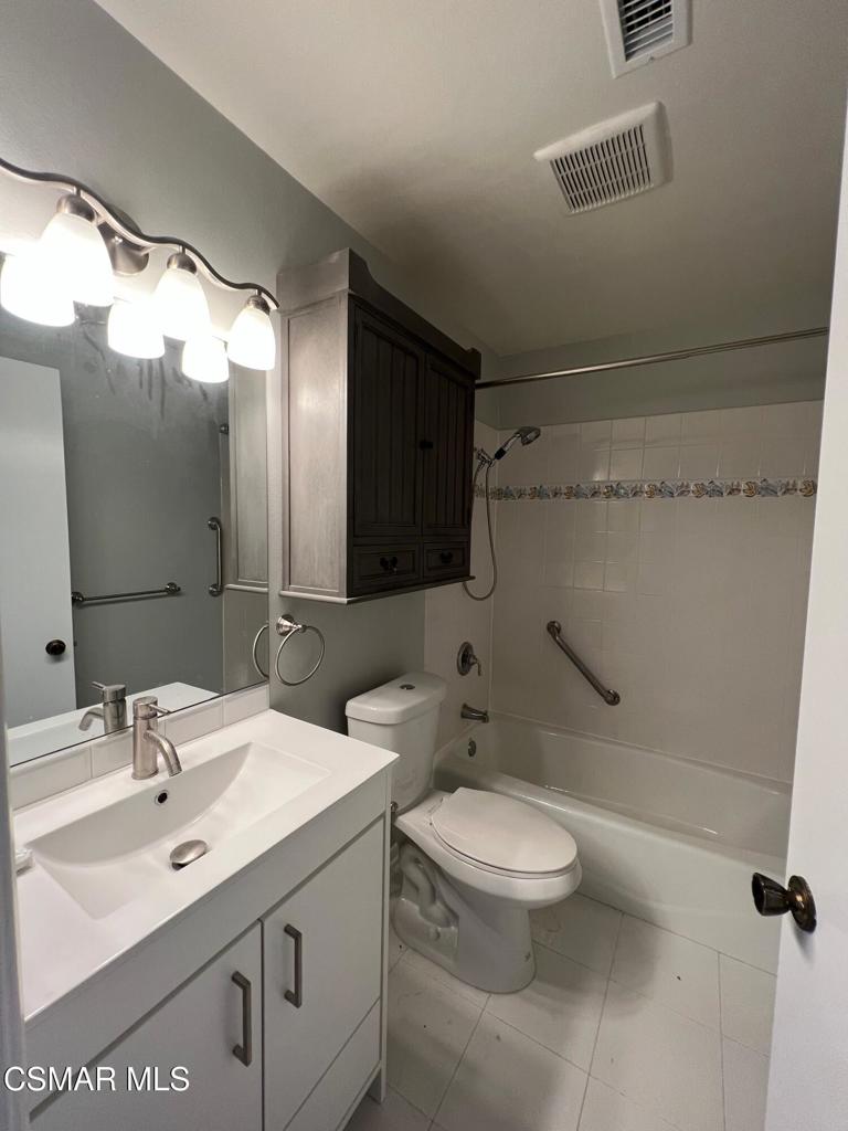 86 Maegan Place, Unit 10 Thousand Oaks, CA 91362 - Photo 8 of 15 a bathroom with a sink a toilet and shower
