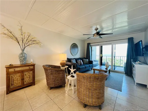 a view of a living room with furniture