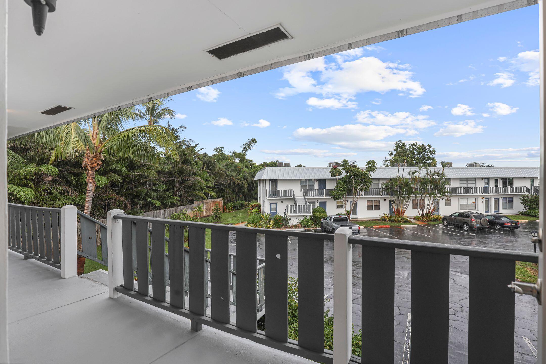 2929 Southeast Ocean Boulevard, Unit 1406 Stuart, FL 34996 - Photo 16 of 27 a view of city from a balcony