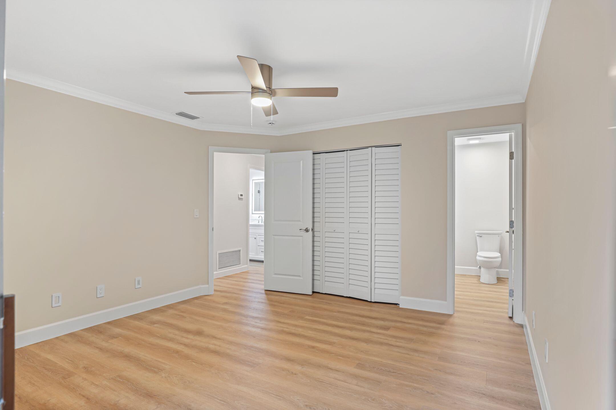 2929 Southeast Ocean Boulevard, Unit 1406 Stuart, FL 34996 - Photo 17 of 27 wooden floor in an empty room