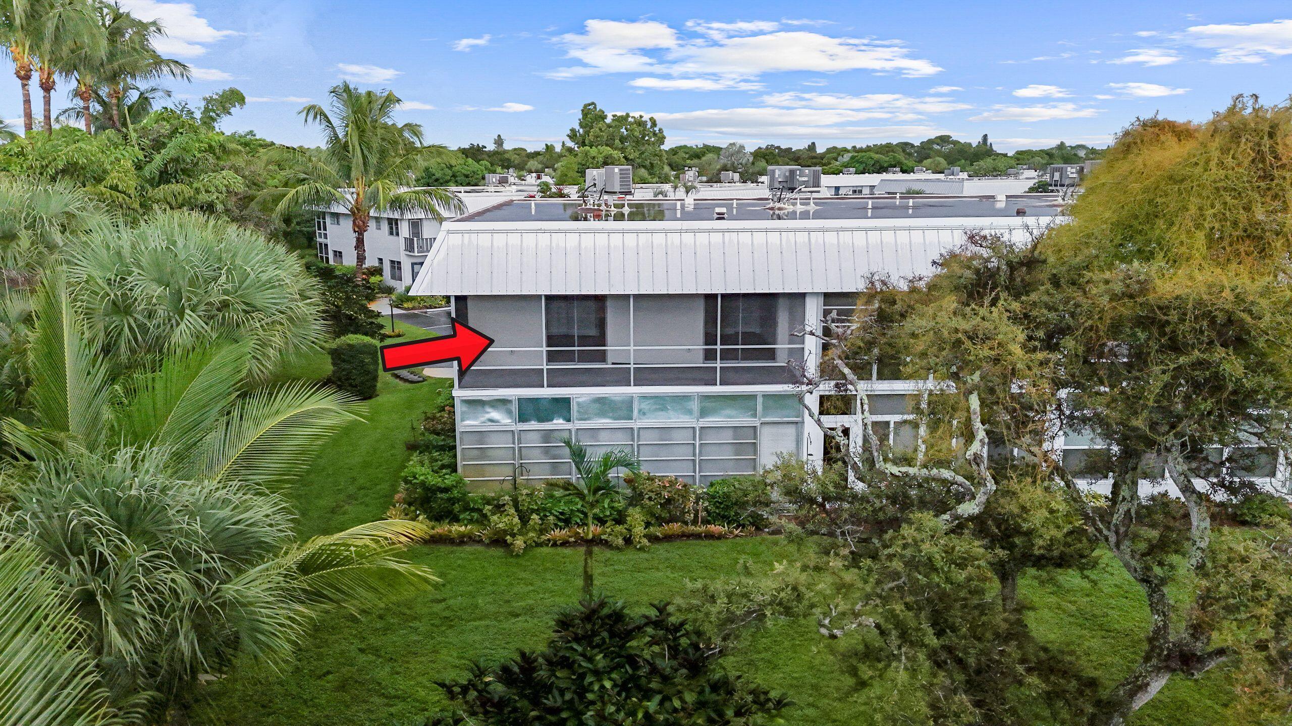 2929 Southeast Ocean Boulevard, Unit 1406 Stuart, FL 34996 - Photo 4 of 27 a view of a garden