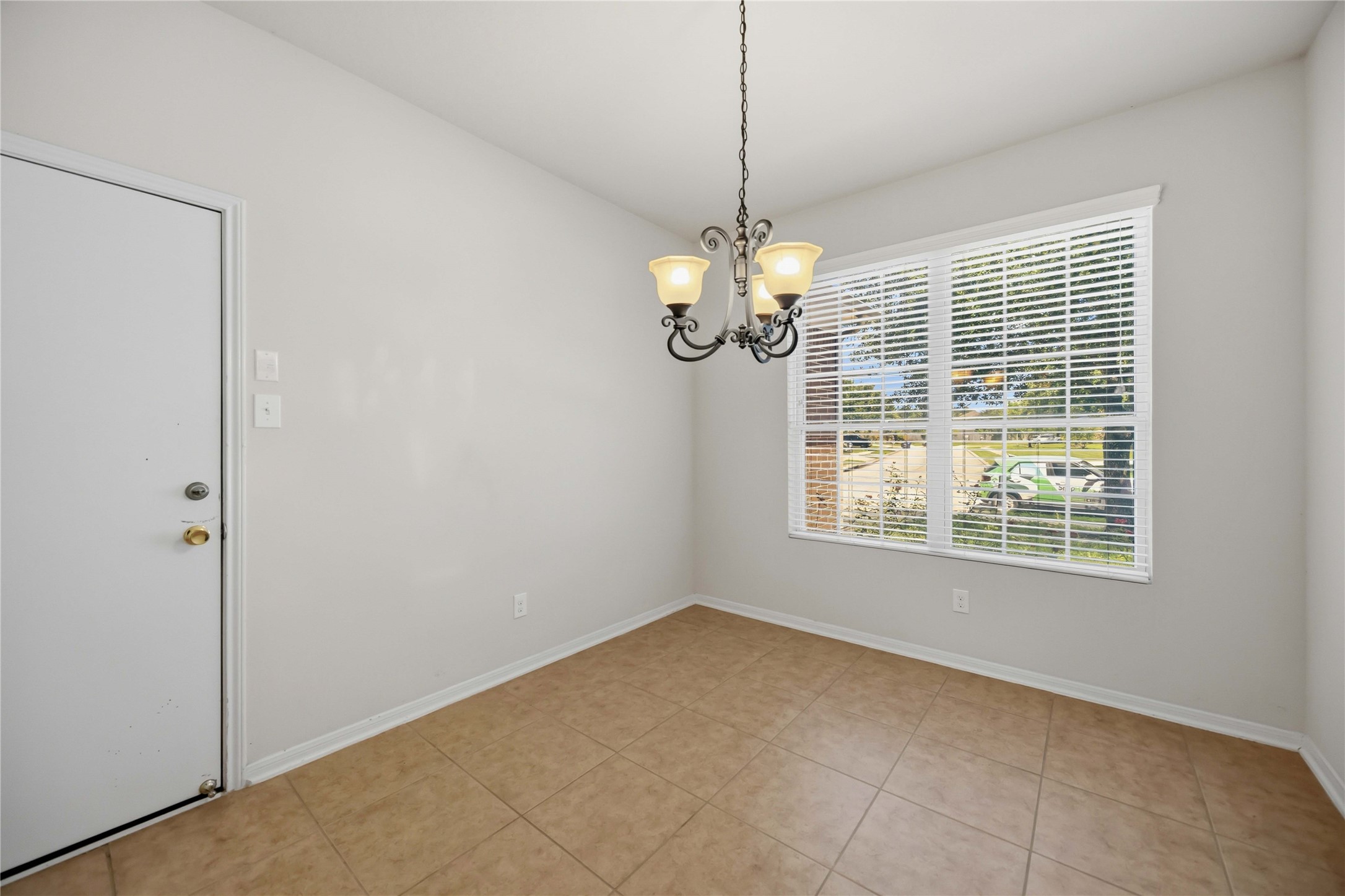 29526 Winton Wood Way Spring, TX 77386 - Photo 10 of 29 Breakfast area featuring natural light and direct access to the attached two-car garage.
