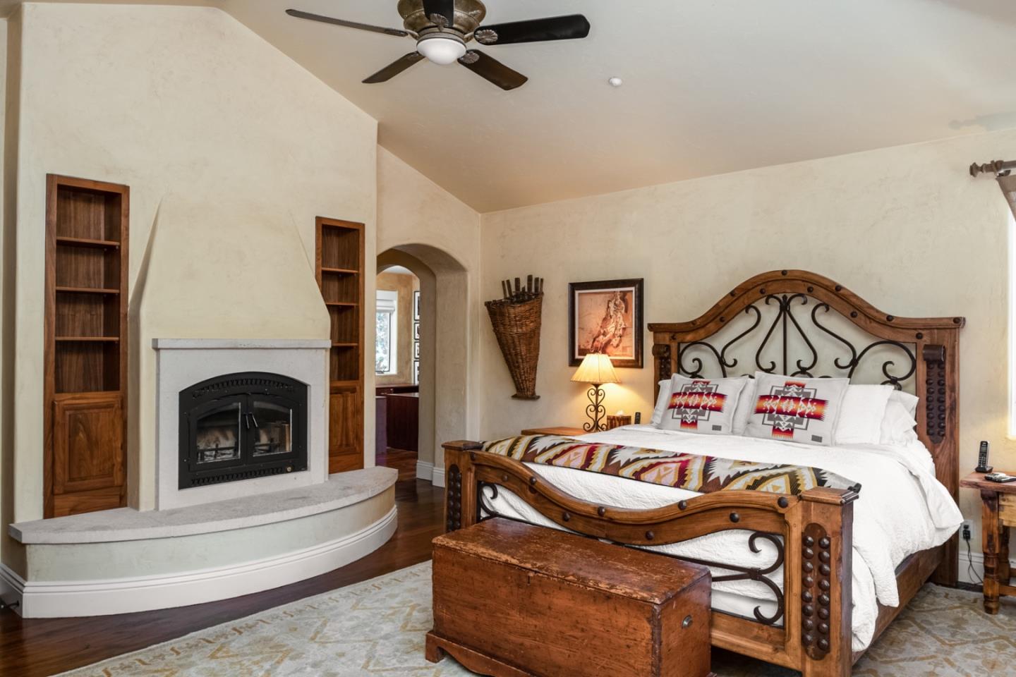 27835 Mesa Del Toro Road Salinas, CA 93908 - Photo 14 of 44 a bedroom with furniture and a fireplace