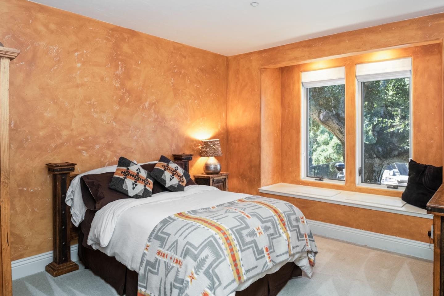 27835 Mesa Del Toro Road Salinas, CA 93908 - Photo 20 of 44 a bed sitting in a bedroom next to a window