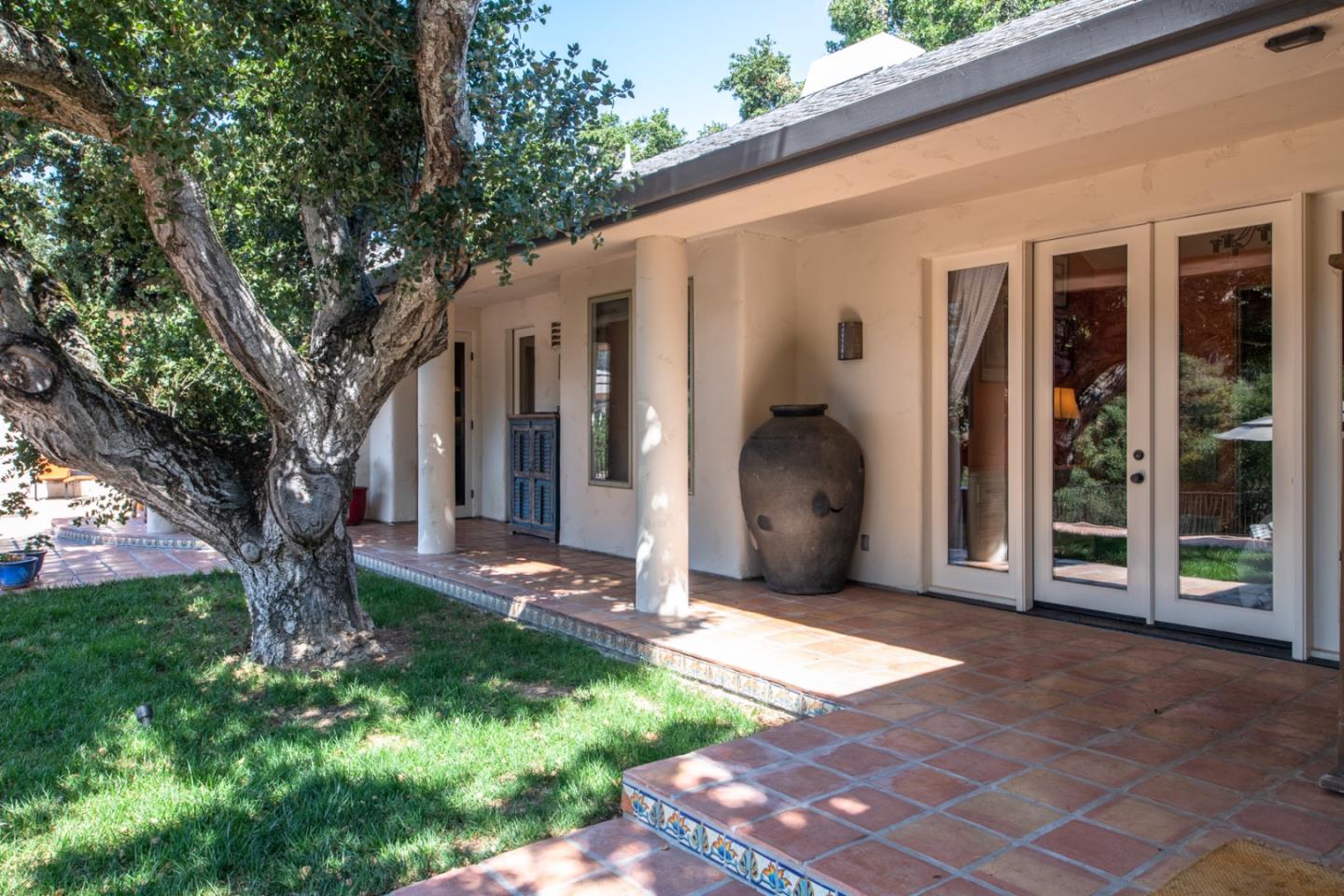 27835 Mesa Del Toro Road Salinas, CA 93908 - Photo 26 of 44 a view of a house with backyard and a tree