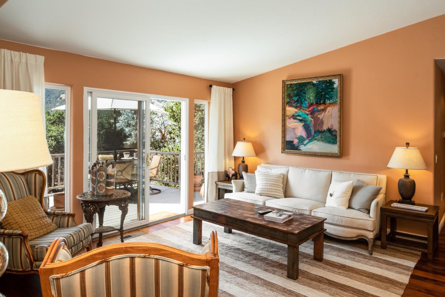 27835 Mesa Del Toro Road Salinas, CA 93908 - Photo 36 of 44 a living room with furniture a table and a floor to ceiling window
