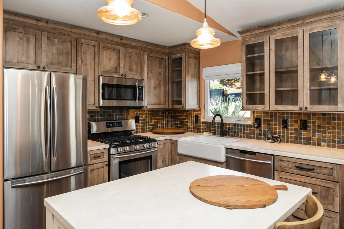 27835 Mesa Del Toro Road Salinas, CA 93908 - Photo 41 of 44 a kitchen with a refrigerator sink and stove