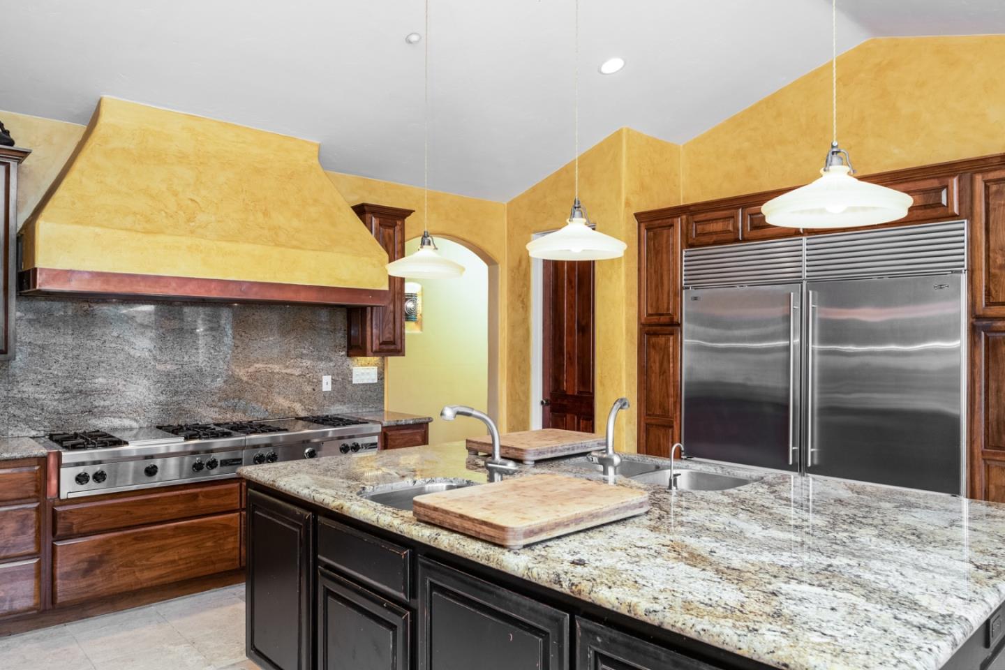 27835 Mesa Del Toro Road Salinas, CA 93908 - Photo 9 of 44 a bathroom with a granite countertop sink and a mirror