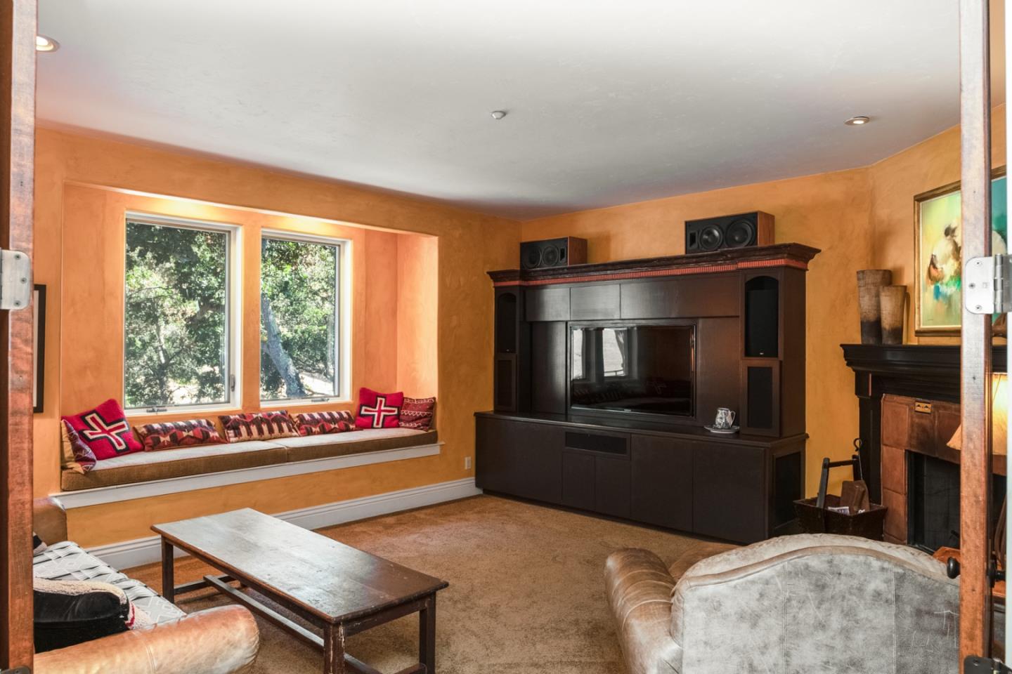 27835 Mesa Del Toro Road Salinas, CA 93908 - Photo 10 of 44 a living room with furniture and a flat screen tv