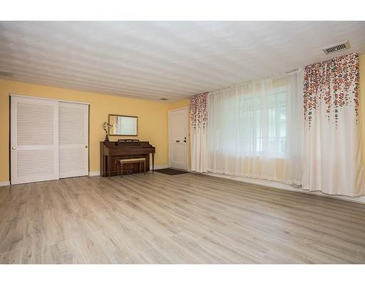 7 Derringer Road Chelmsford, MA 01824 - Photo 8 of 28 a view of a livingroom with wooden floor