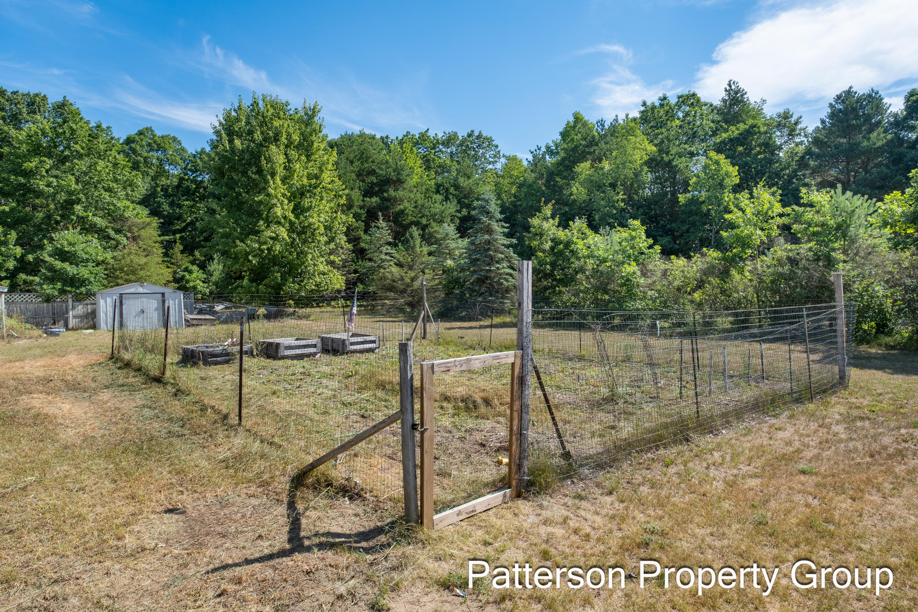 11322 Hall Road Ravenna, MI 49451 - Photo 18 of 41 Fully Fenced in Garden