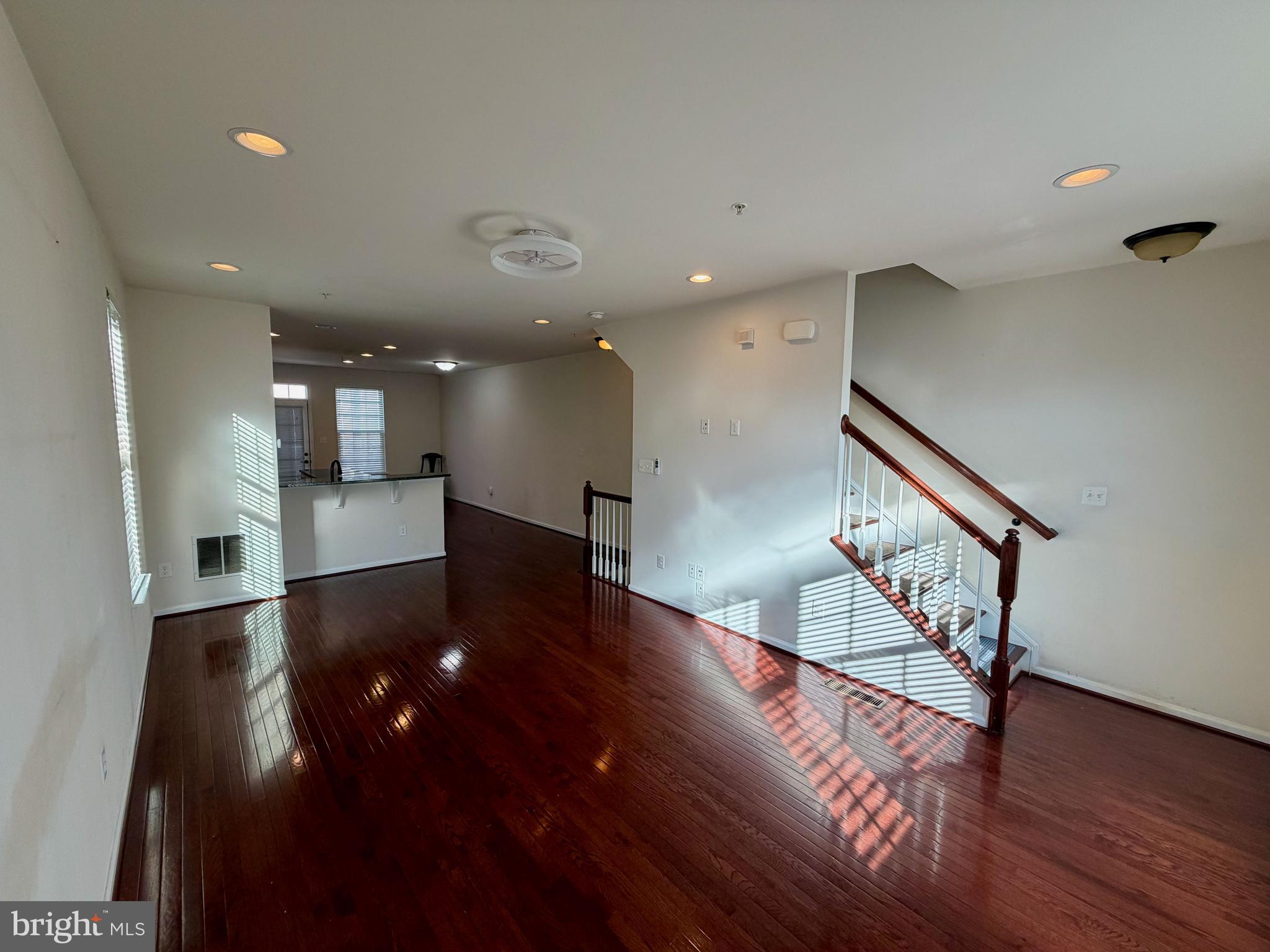 7729 Duncannon Lane Hanover, MD 21076 - Photo 14 of 26 a view of an entryway with wooden floor