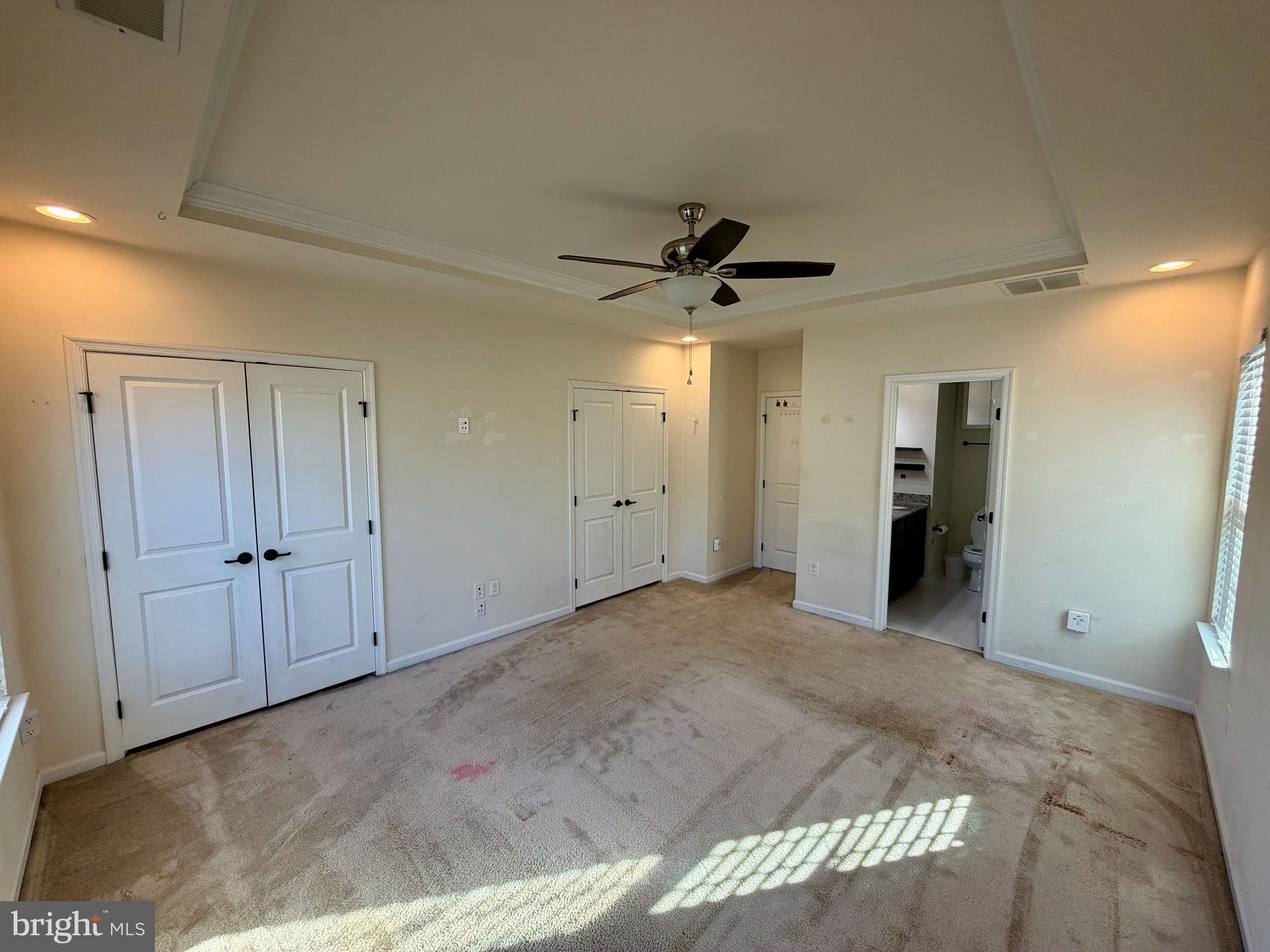 7729 Duncannon Lane Hanover, MD 21076 - Photo 16 of 26 a view of a livingroom with a ceiling fan