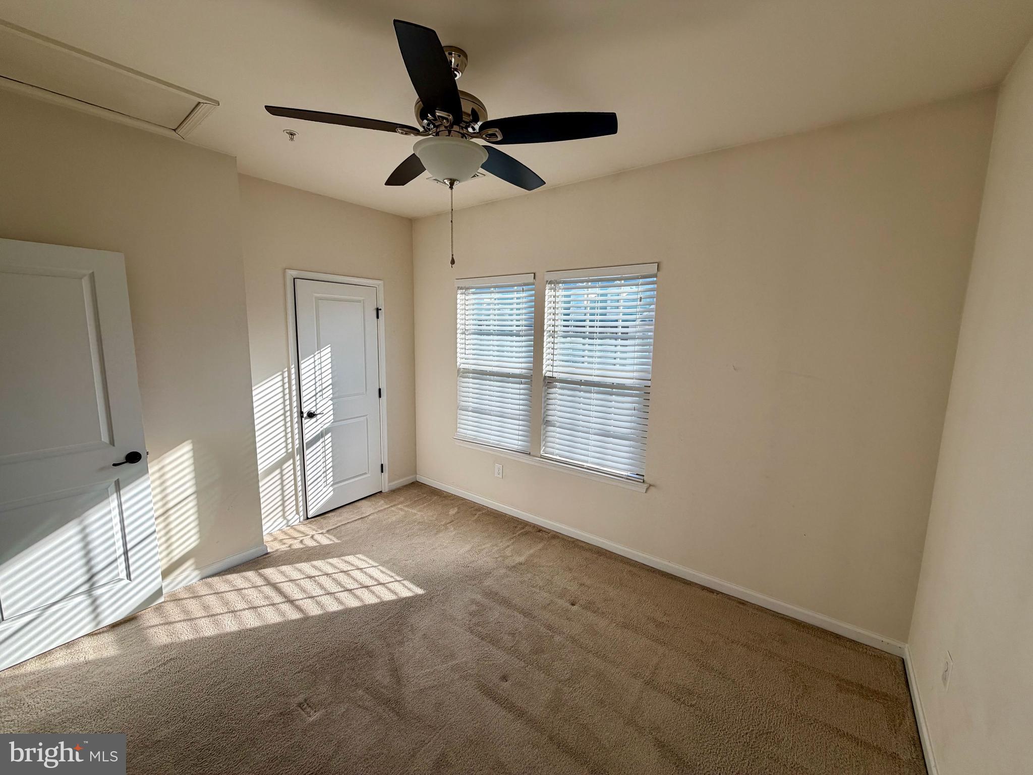 7729 Duncannon Lane Hanover, MD 21076 - Photo 21 of 26 a view of a livingroom with a ceiling fan and window