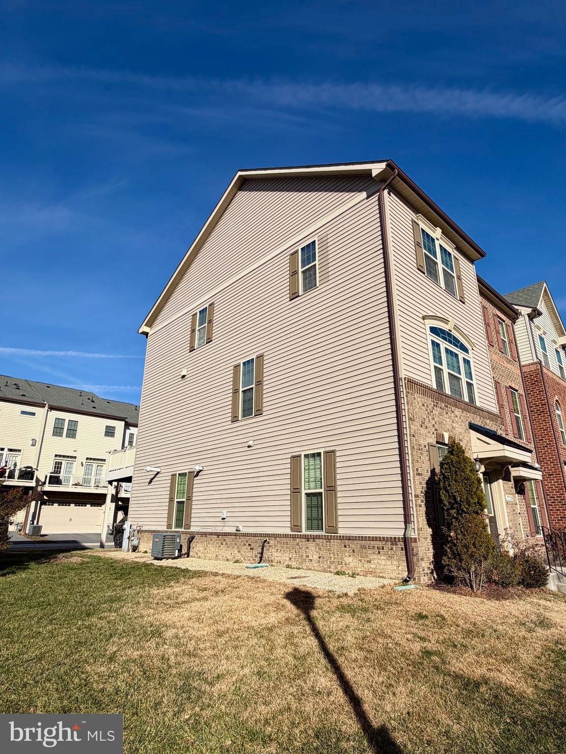 7729 Duncannon Lane Hanover, MD 21076 - Photo 24 of 26 a view of a house with a patio