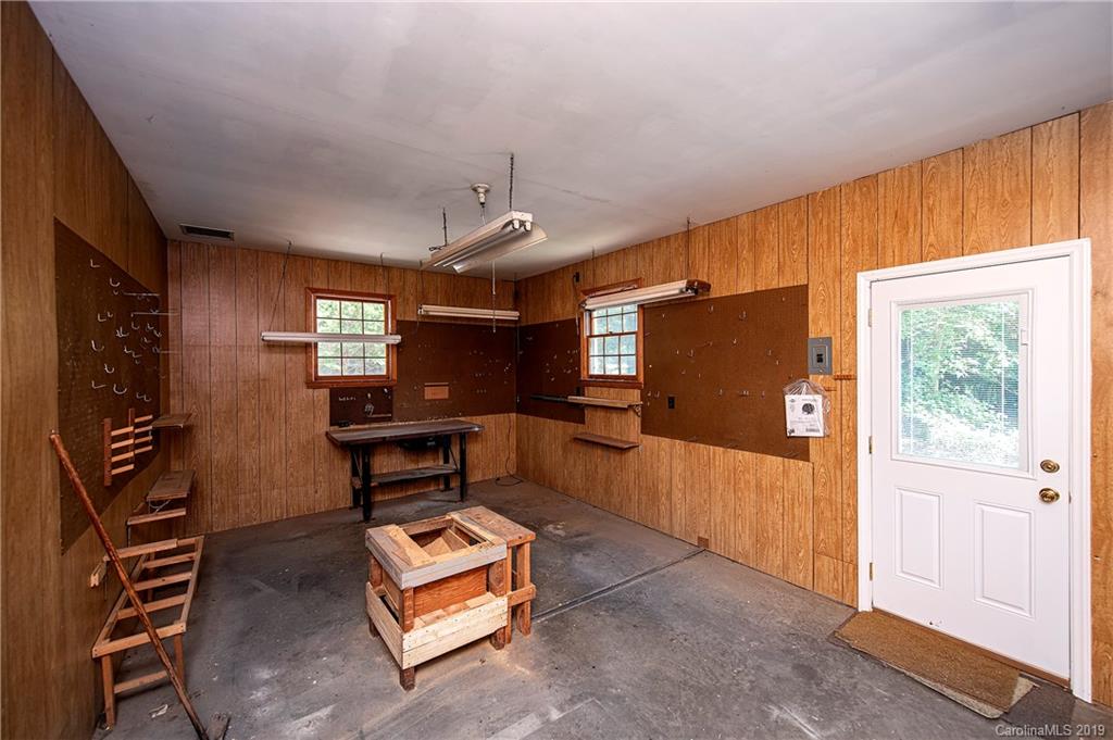 3703 High Ridge Road Charlotte, NC 28270 - Photo 22 of 25 a living room with furniture a piano and a window