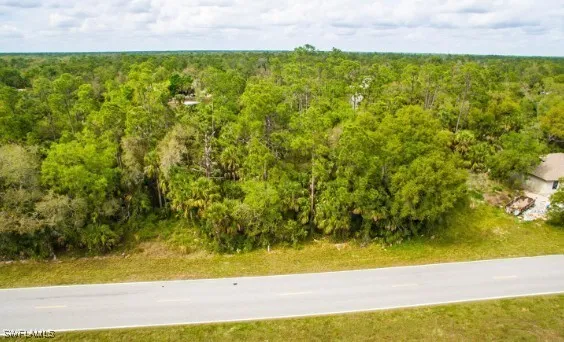 a view of a yard with an outdoor space