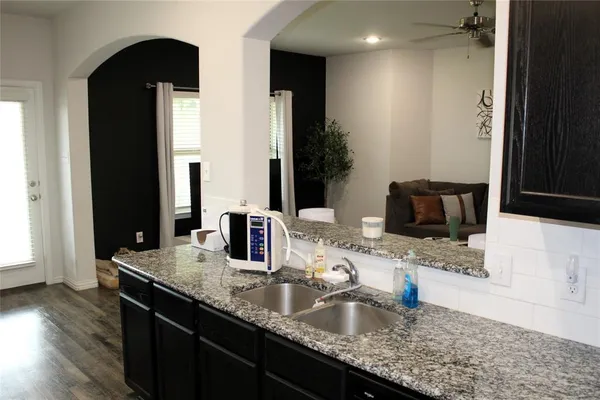 a bathroom with sinks double vanity and a mirror