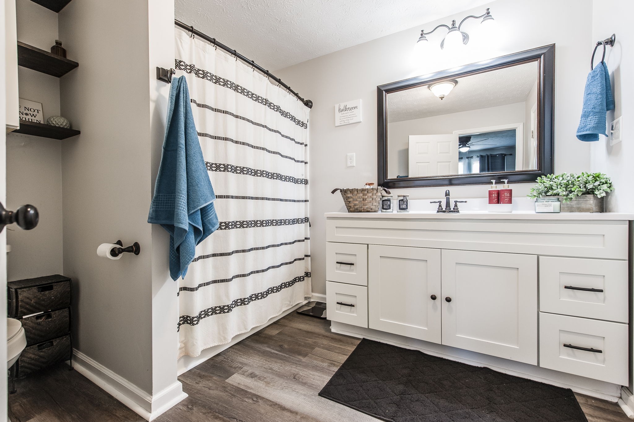 3014 Academy Road Portland, TN 37148 - Photo 18 of 42 a bathroom with a double vanity sink and mirror