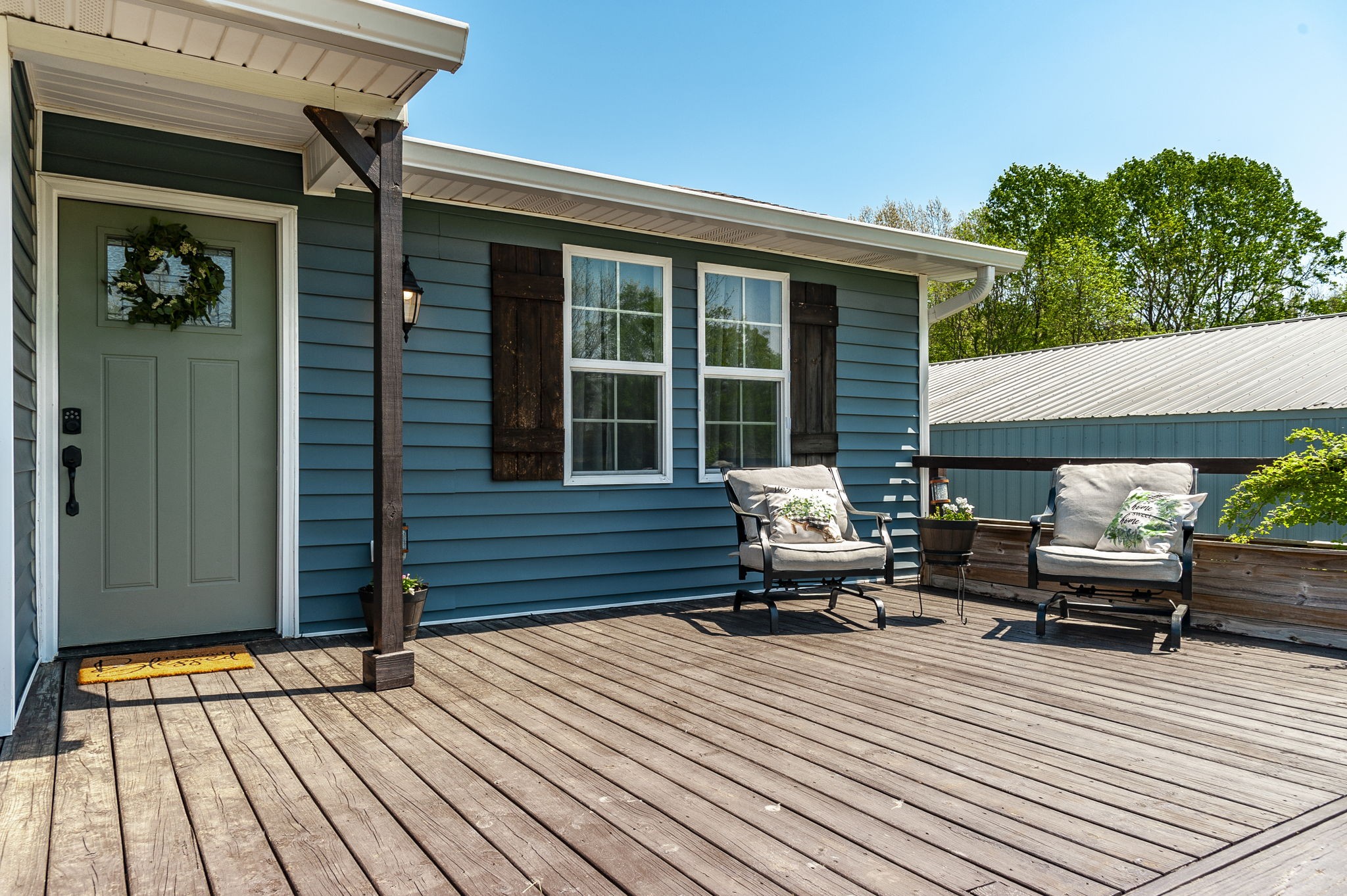 3014 Academy Road Portland, TN 37148 - Photo 24 of 42 a view of a wooden deck with furniture