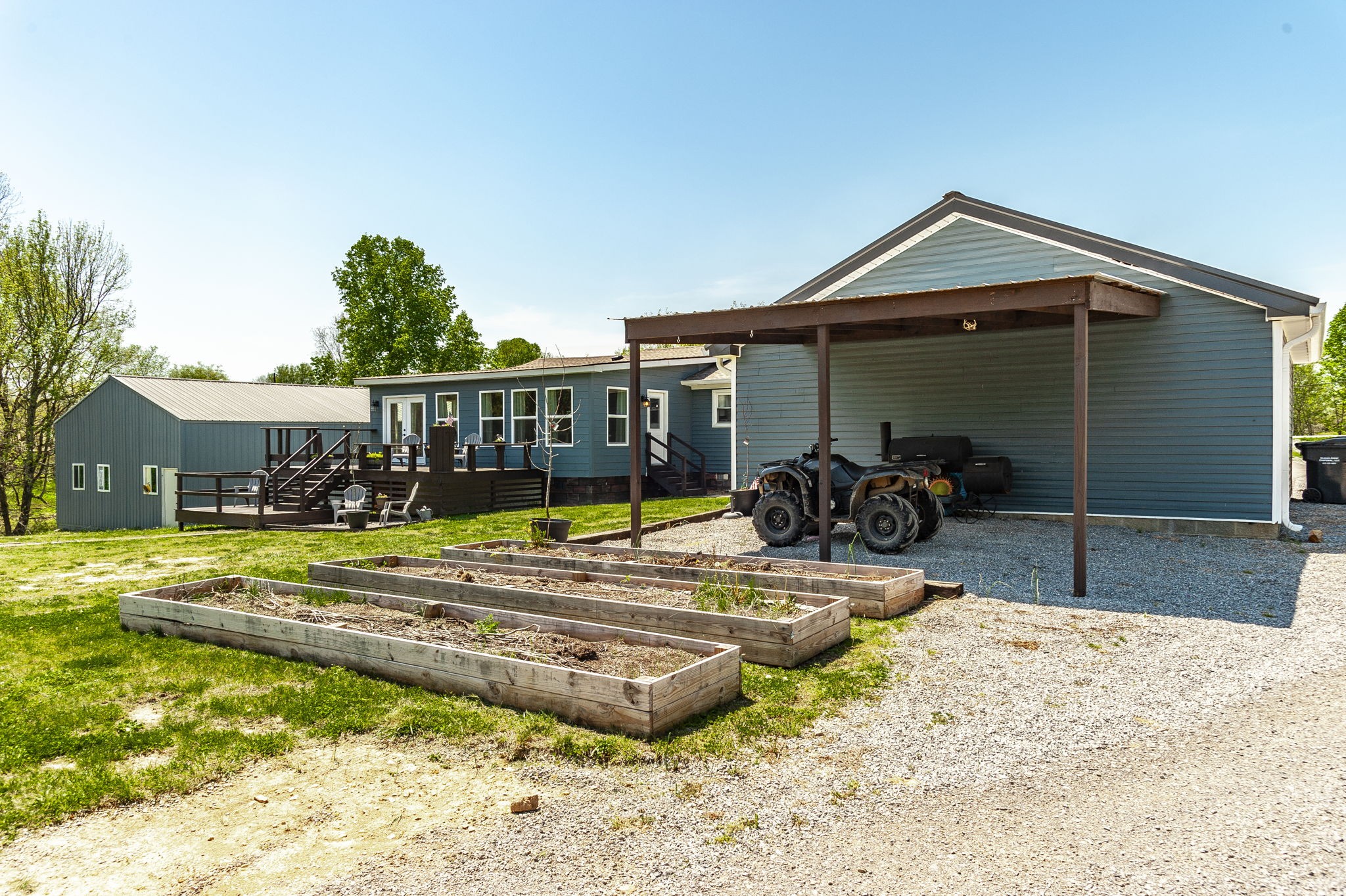 3014 Academy Road Portland, TN 37148 - Photo 26 of 42 a view of a house with swimming pool and sitting area