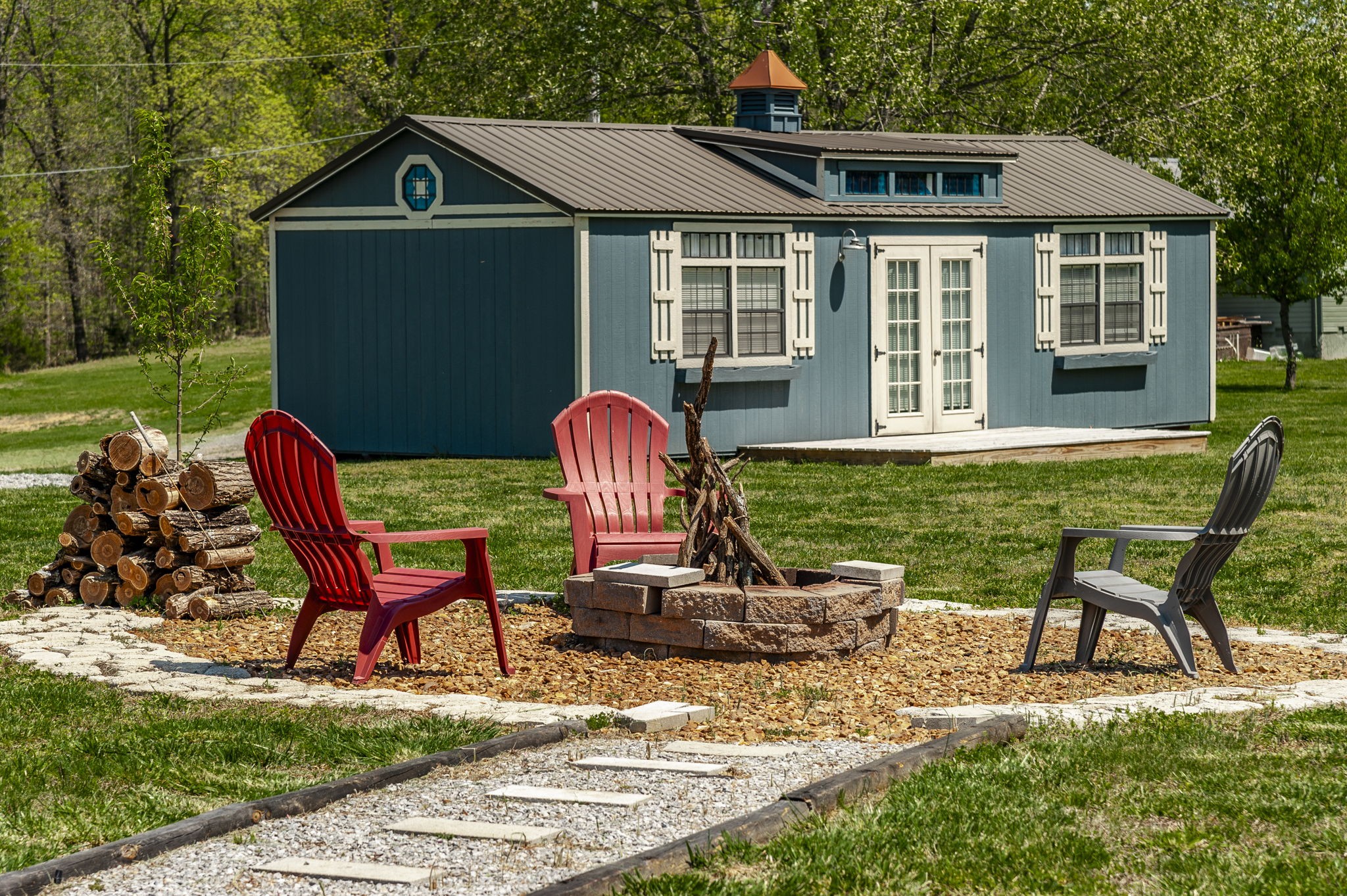 3014 Academy Road Portland, TN 37148 - Photo 27 of 42 a front view of a house with a yard table and chairs
